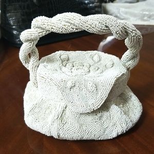 Antique white seed bead handbag. Sculpted beading designs.